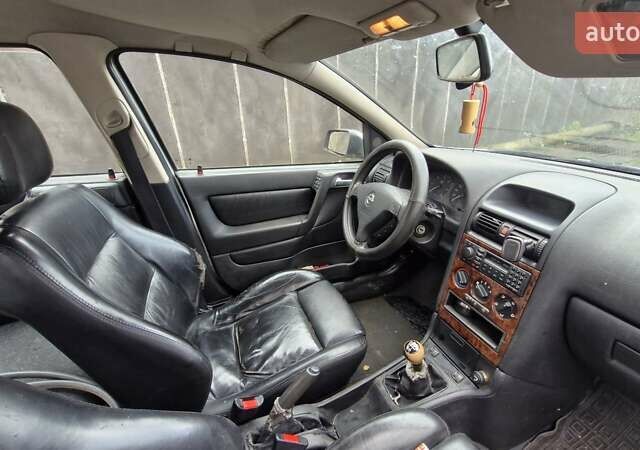 Серый Опель Астра, объемом двигателя 1.69 л и пробегом 327 тыс. км за 2500 $, фото 8 на Automoto.ua