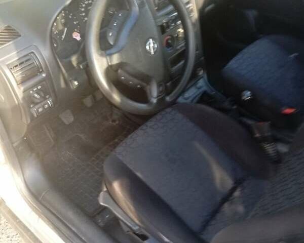 Серый Опель Астра, объемом двигателя 1.6 л и пробегом 337 тыс. км за 1771 $, фото 1 на Automoto.ua