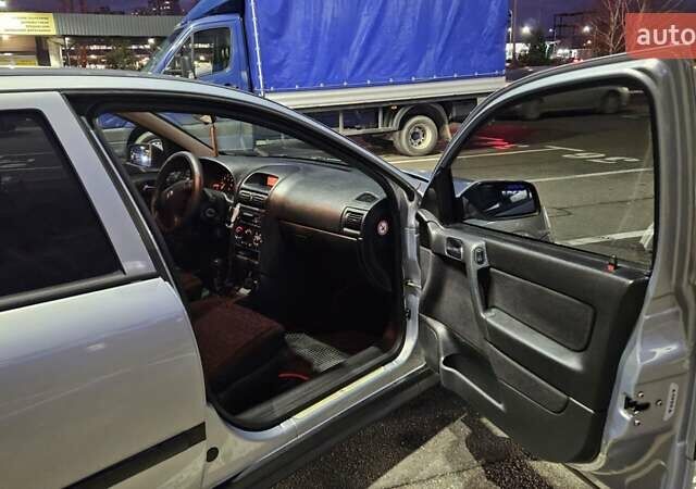 Серый Опель Астра, объемом двигателя 2 л и пробегом 341 тыс. км за 4000 $, фото 7 на Automoto.ua