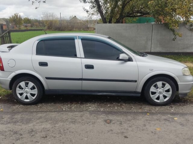 Серый Опель Астра, объемом двигателя 2 л и пробегом 200 тыс. км за 3000 $, фото 2 на Automoto.ua