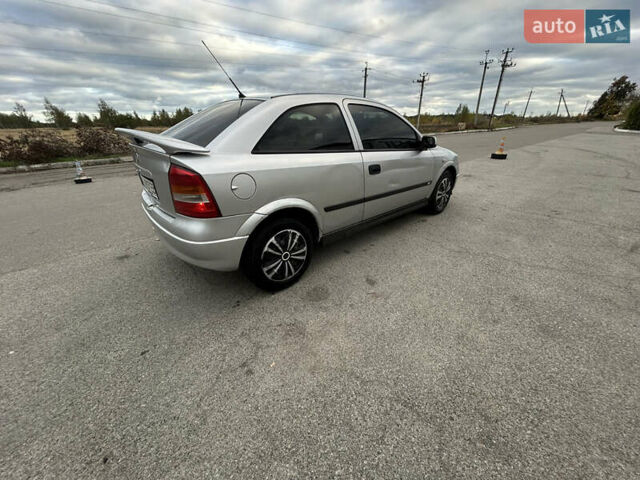 Серый Опель Астра, объемом двигателя 2 л и пробегом 362 тыс. км за 2100 $, фото 2 на Automoto.ua