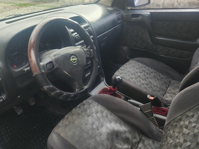 Серый Опель Астра, объемом двигателя 2 л и пробегом 300 тыс. км за 980 $, фото 6 на Automoto.ua