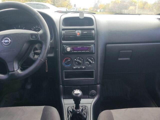 Серый Опель Астра, объемом двигателя 2 л и пробегом 200 тыс. км за 3000 $, фото 7 на Automoto.ua