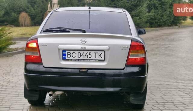 Серый Опель Астра, объемом двигателя 1.7 л и пробегом 170 тыс. км за 1900 $, фото 7 на Automoto.ua