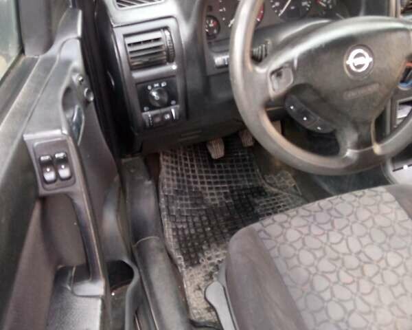 Серый Опель Астра, объемом двигателя 1.69 л и пробегом 300 тыс. км за 2900 $, фото 7 на Automoto.ua