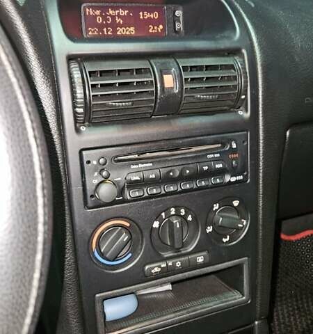 Серый Опель Астра, объемом двигателя 2 л и пробегом 341 тыс. км за 4000 $, фото 13 на Automoto.ua