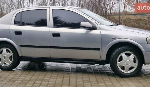 Серый Опель Астра, объемом двигателя 1.7 л и пробегом 170 тыс. км за 1900 $, фото 4 на Automoto.ua