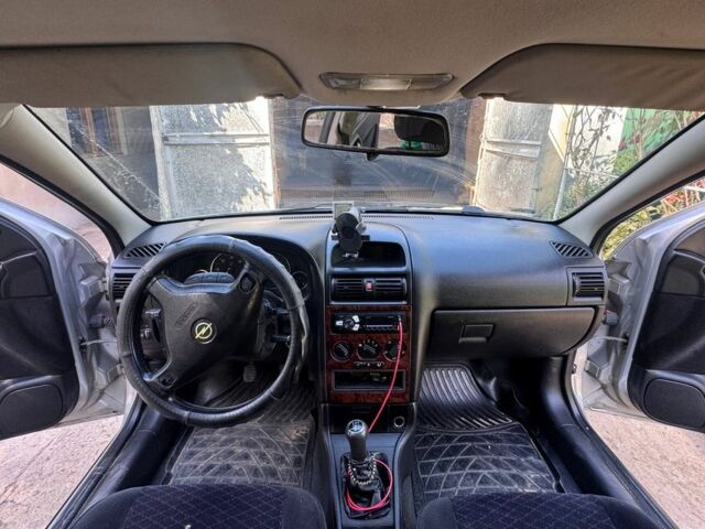 Серый Опель Астра, объемом двигателя 2 л и пробегом 360 тыс. км за 3600 $, фото 5 на Automoto.ua