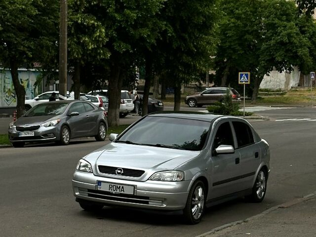 Серый Опель Астра, объемом двигателя 1.6 л и пробегом 213 тыс. км за 3400 $, фото 4 на Automoto.ua