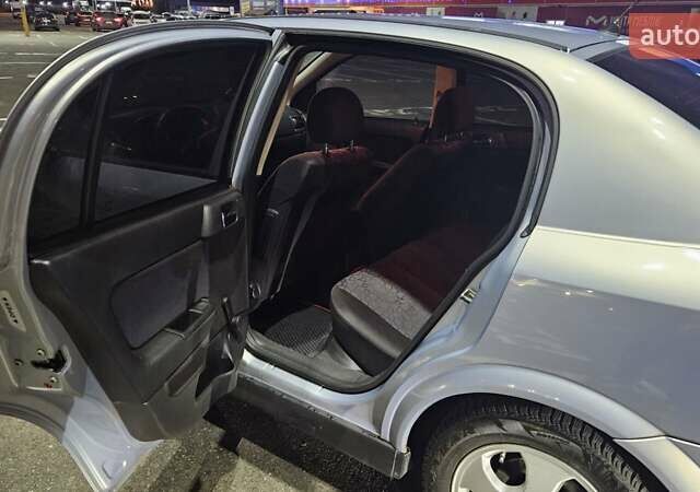 Серый Опель Астра, объемом двигателя 2 л и пробегом 341 тыс. км за 4000 $, фото 6 на Automoto.ua