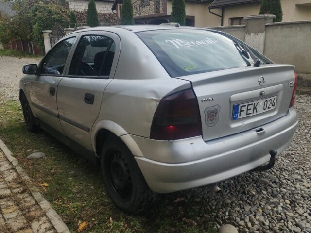 Серый Опель Астра, объемом двигателя 2 л и пробегом 300 тыс. км за 980 $, фото 5 на Automoto.ua