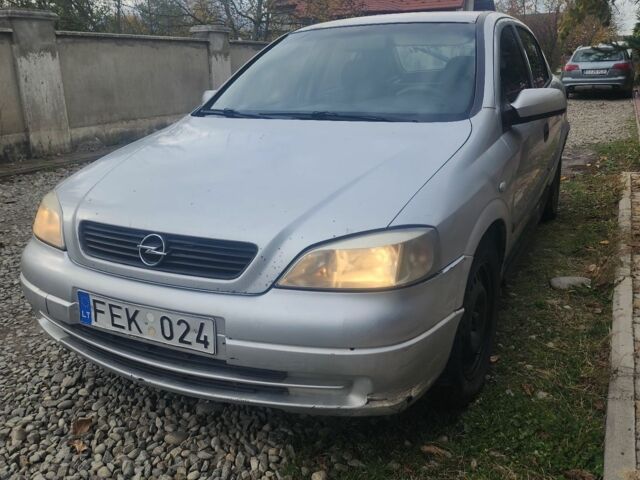 Серый Опель Астра, объемом двигателя 2 л и пробегом 300 тыс. км за 980 $, фото 2 на Automoto.ua