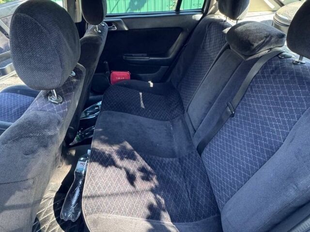 Серый Опель Астра, объемом двигателя 2 л и пробегом 360 тыс. км за 3600 $, фото 4 на Automoto.ua