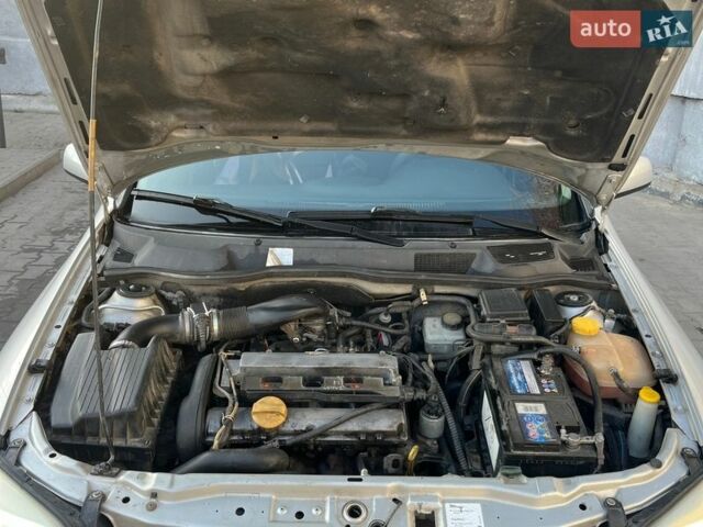 Серый Опель Астра, объемом двигателя 1.8 л и пробегом 318 тыс. км за 2900 $, фото 18 на Automoto.ua