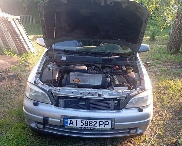 Серый Опель Астра, объемом двигателя 1.6 л и пробегом 337 тыс. км за 1771 $, фото 3 на Automoto.ua