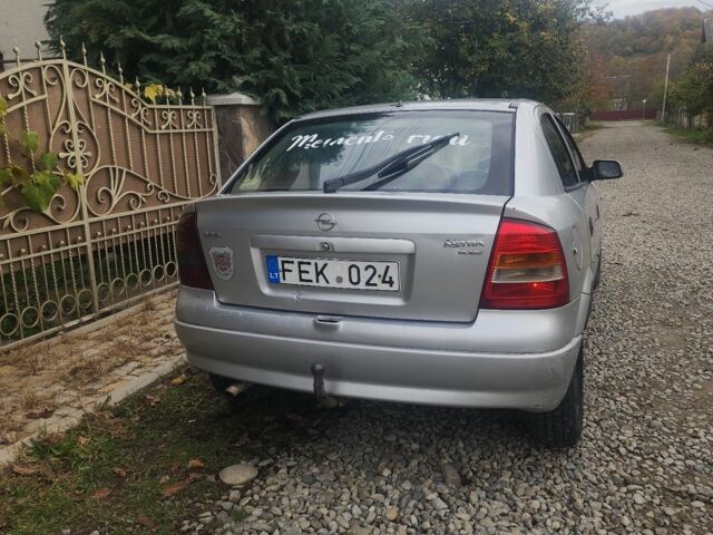 Серый Опель Астра, объемом двигателя 2 л и пробегом 300 тыс. км за 980 $, фото 4 на Automoto.ua