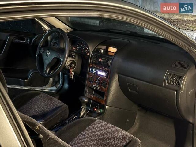 Серый Опель Астра, объемом двигателя 1.6 л и пробегом 453 тыс. км за 2000 $, фото 16 на Automoto.ua