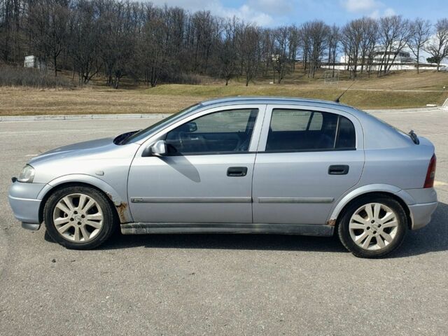 Серый Опель Астра, объемом двигателя 1.6 л и пробегом 255 тыс. км за 3500 $, фото 1 на Automoto.ua