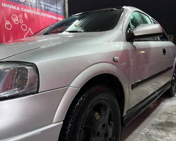 Серый Опель Астра, объемом двигателя 1.6 л и пробегом 453 тыс. км за 2000 $, фото 6 на Automoto.ua