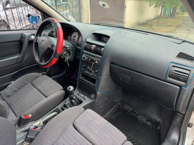 Серый Опель Астра, объемом двигателя 1.8 л и пробегом 300 тыс. км за 1199 $, фото 10 на Automoto.ua