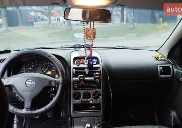 Сірий Опель Астра, об'ємом двигуна 2 л та пробігом 300 тис. км за 3300 $, фото 10 на Automoto.ua