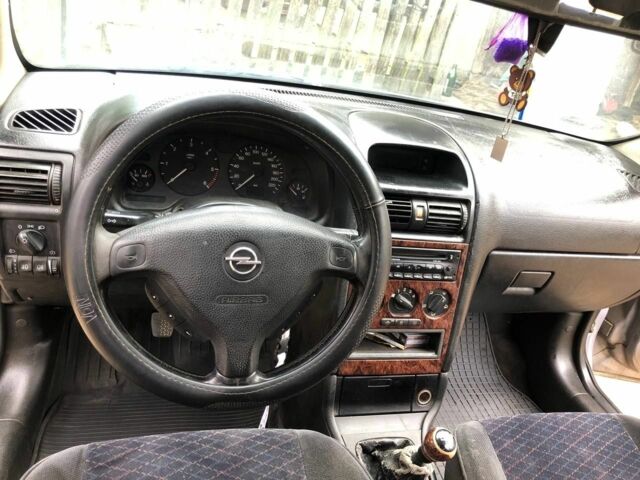 Серый Опель Астра, объемом двигателя 0 л и пробегом 400 тыс. км за 900 $, фото 8 на Automoto.ua