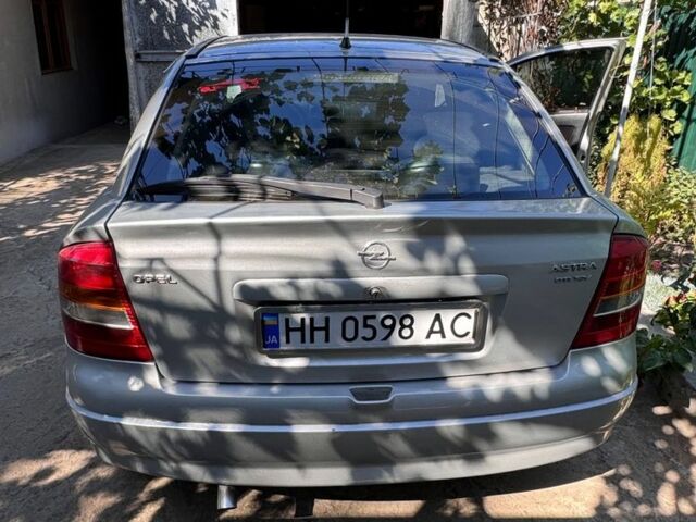 Серый Опель Астра, объемом двигателя 2 л и пробегом 360 тыс. км за 3600 $, фото 3 на Automoto.ua