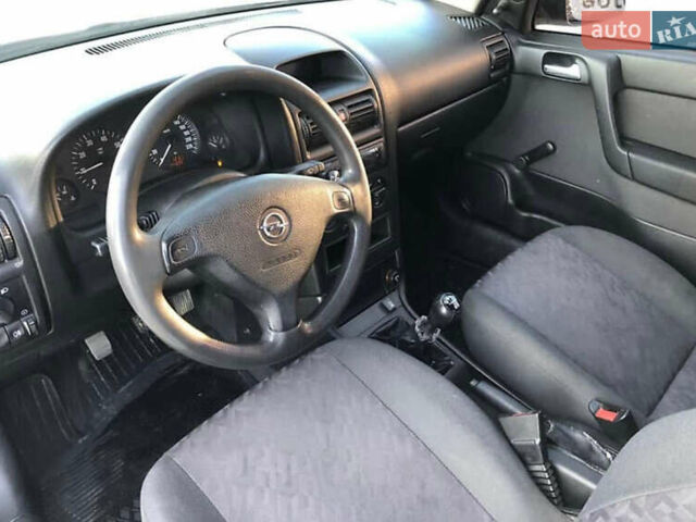 Серый Опель Астра, объемом двигателя 1.6 л и пробегом 244 тыс. км за 3000 $, фото 9 на Automoto.ua