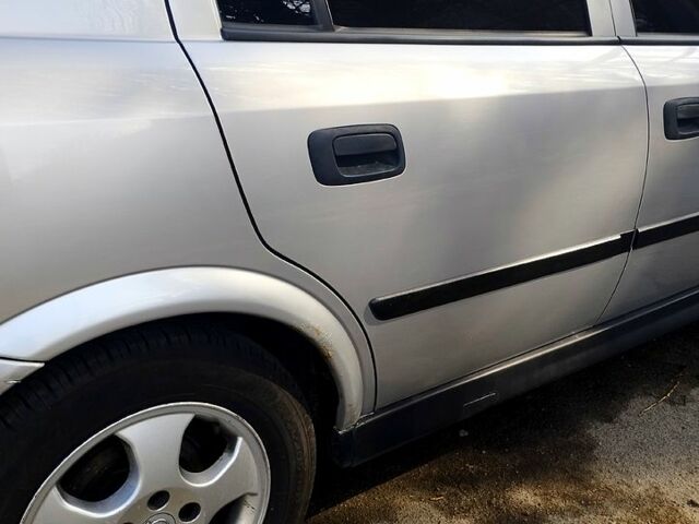 Сірий Опель Астра, об'ємом двигуна 2 л та пробігом 286 тис. км за 3200 $, фото 5 на Automoto.ua