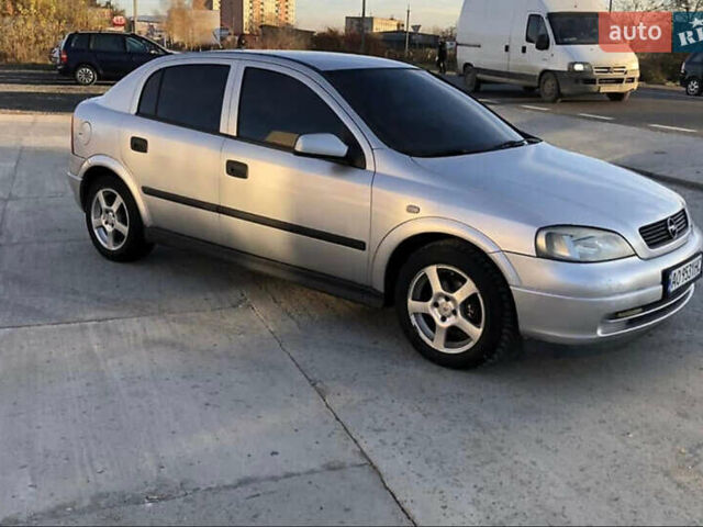 Серый Опель Астра, объемом двигателя 1.6 л и пробегом 244 тыс. км за 3000 $, фото 4 на Automoto.ua