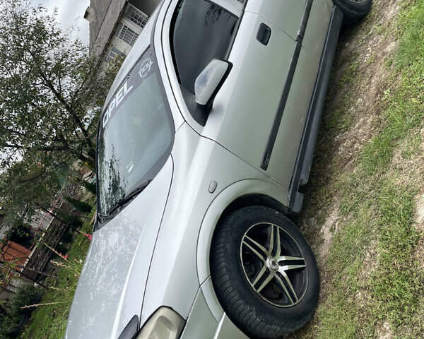 Серый Опель Астра, объемом двигателя 2 л и пробегом 420 тыс. км за 2000 $, фото 4 на Automoto.ua