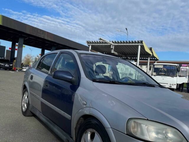 Серый Опель Астра, объемом двигателя 2 л и пробегом 288 тыс. км за 1400 $, фото 7 на Automoto.ua