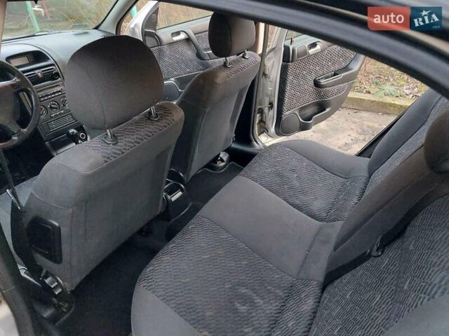 Серый Опель Астра, объемом двигателя 2 л и пробегом 350 тыс. км за 2500 $, фото 7 на Automoto.ua