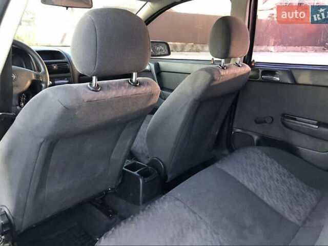 Серый Опель Астра, объемом двигателя 1.6 л и пробегом 244 тыс. км за 3000 $, фото 13 на Automoto.ua