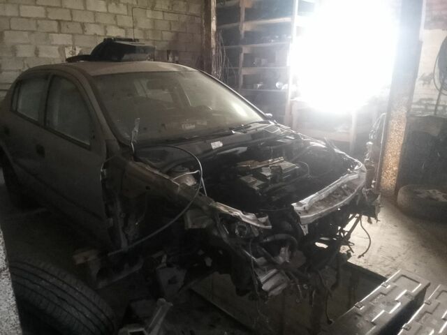 Серый Опель Астра, объемом двигателя 2 л и пробегом 230 тыс. км за 1000 $, фото 2 на Automoto.ua