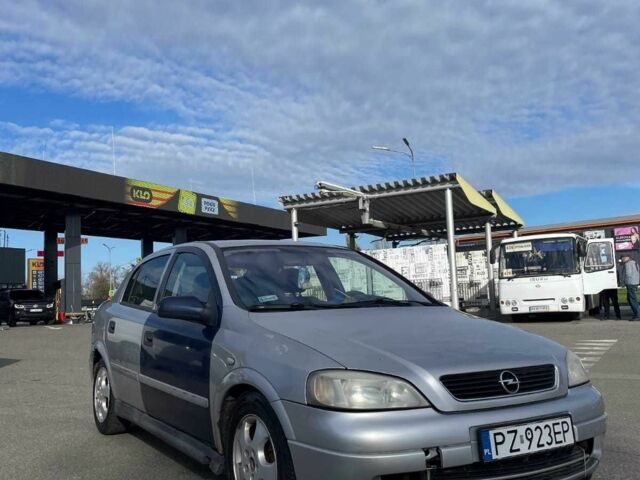 Серый Опель Астра, объемом двигателя 2 л и пробегом 288 тыс. км за 1400 $, фото 4 на Automoto.ua