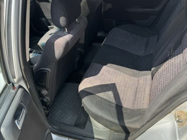 Серый Опель Астра, объемом двигателя 1.6 л и пробегом 301 тыс. км за 3400 $, фото 5 на Automoto.ua