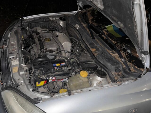 Сірий Опель Астра, об'ємом двигуна 2 л та пробігом 288 тис. км за 900 $, фото 8 на Automoto.ua