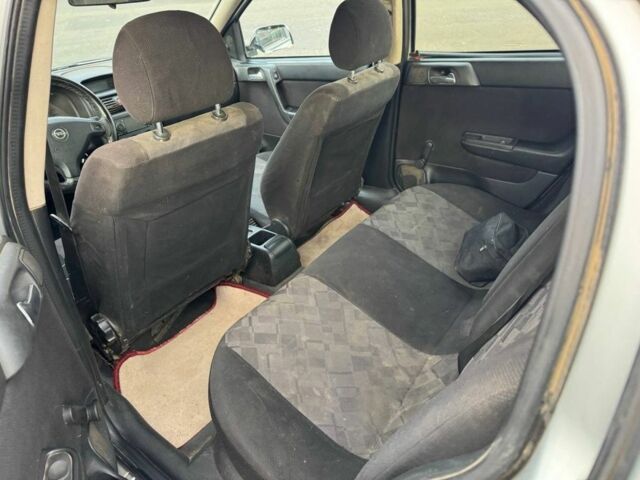 Серый Опель Астра, объемом двигателя 1.7 л и пробегом 300 тыс. км за 899 $, фото 8 на Automoto.ua