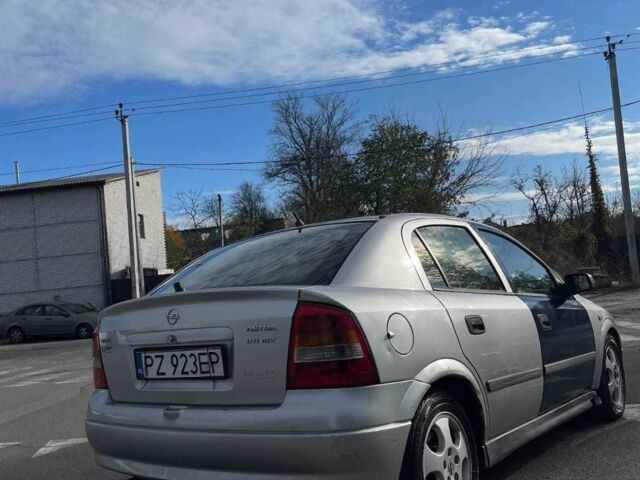 Серый Опель Астра, объемом двигателя 2 л и пробегом 288 тыс. км за 1400 $, фото 9 на Automoto.ua