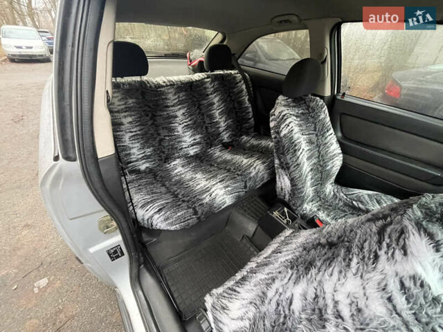 Серый Опель Астра, объемом двигателя 1.6 л и пробегом 257 тыс. км за 3500 $, фото 13 на Automoto.ua