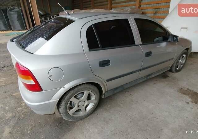 Серый Опель Астра, объемом двигателя 1.6 л и пробегом 255 тыс. км за 2500 $, фото 1 на Automoto.ua