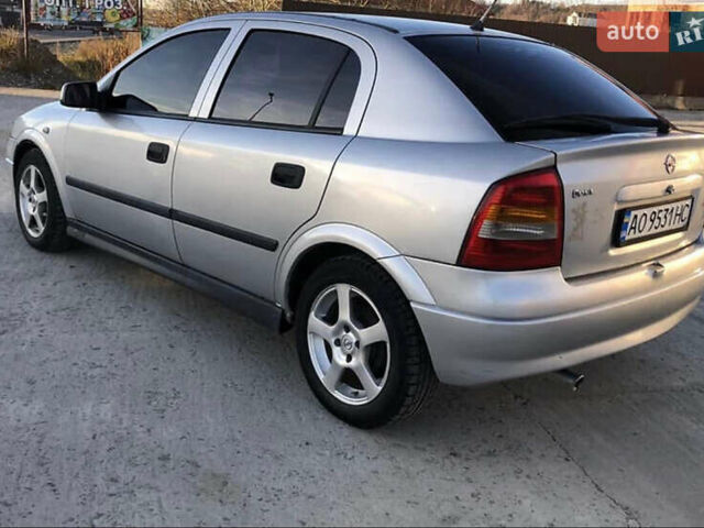 Серый Опель Астра, объемом двигателя 1.6 л и пробегом 244 тыс. км за 3000 $, фото 7 на Automoto.ua