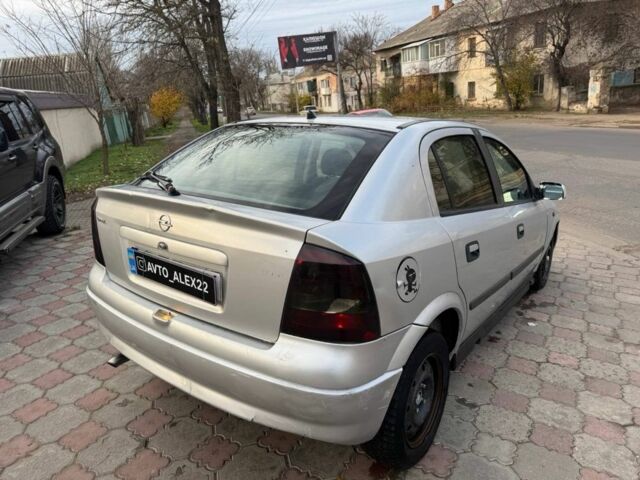 Серый Опель Астра, объемом двигателя 1.7 л и пробегом 300 тыс. км за 899 $, фото 3 на Automoto.ua