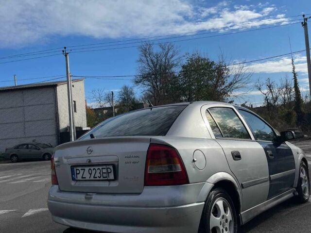 Серый Опель Астра, объемом двигателя 2 л и пробегом 288 тыс. км за 1400 $, фото 11 на Automoto.ua