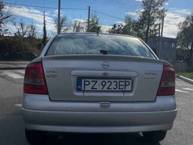 Серый Опель Астра, объемом двигателя 2 л и пробегом 288 тыс. км за 1400 $, фото 13 на Automoto.ua