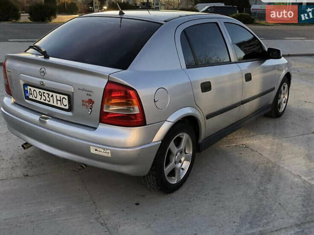 Серый Опель Астра, объемом двигателя 1.6 л и пробегом 244 тыс. км за 3000 $, фото 6 на Automoto.ua