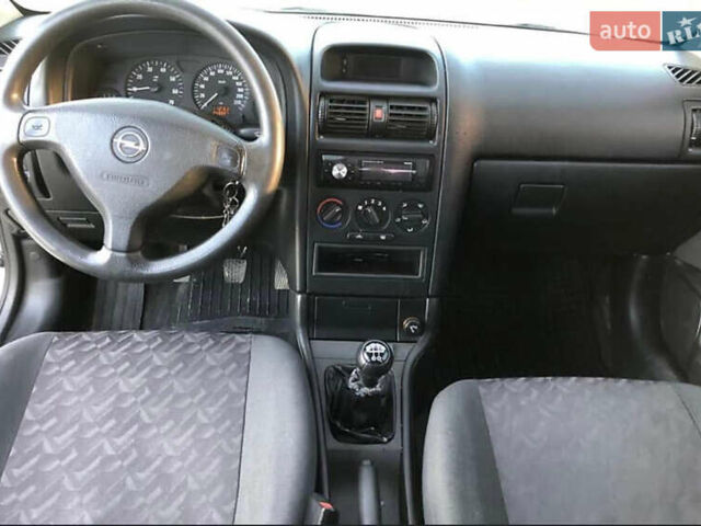 Серый Опель Астра, объемом двигателя 1.6 л и пробегом 244 тыс. км за 3000 $, фото 14 на Automoto.ua