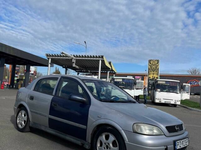 Серый Опель Астра, объемом двигателя 2 л и пробегом 288 тыс. км за 1400 $, фото 6 на Automoto.ua