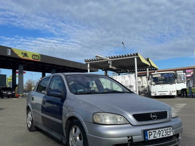 Серый Опель Астра, объемом двигателя 2 л и пробегом 288 тыс. км за 1400 $, фото 3 на Automoto.ua